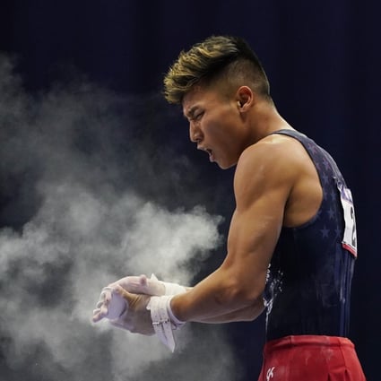 Yul Moldauer claps his hands after competing on the high bar at the Olympic trials in St. Louis. Photo: USA Today