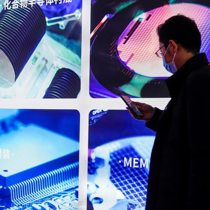 A man visits a display at Semicon China, a trade fair for semiconductor technology, in Shanghai in March. Photo: Reuters
