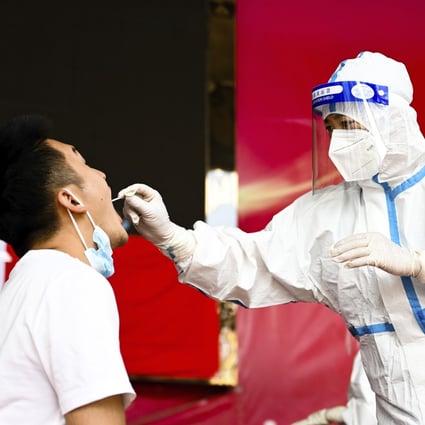 A resident gets tested in Chinese border city Ruili, in Yunnan, on Monday. Photo: Xinhua
