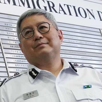 Director of Immigration, Au Ka-wang poses for a photo during a press conference at the Immigration Tower in Wan Chai. Photo: Winson Wong