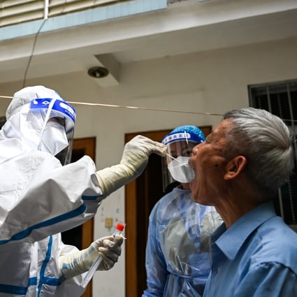 A resident gets tested in Ruili, Yunnan province on Thursday. The city on the border with Myanmar has been hit by a fourth wave of Covid-19. Photo: Xinhua
