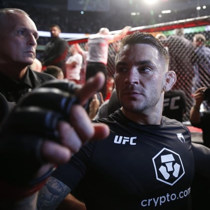 Dustin Poirier celebrates after beating Conor McGregor via doctor stoppage. Photo: Reuters