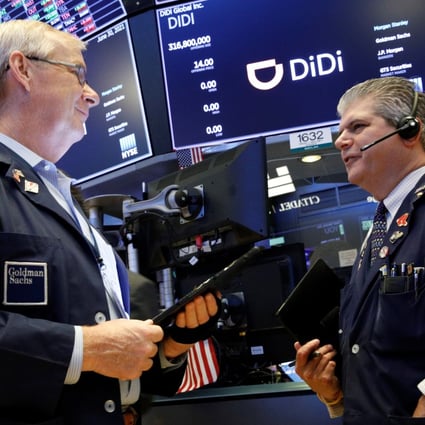 Traders work during the IPO for Chinese ride-hailing company Didi Global on the New York Stock Exchange in June. Photo: Reuters
