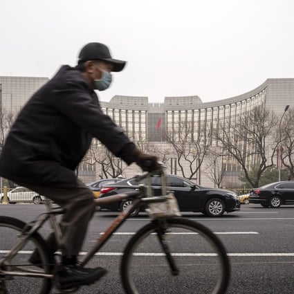 The People’s Bank of China (PBOC) said late on Friday it would trim the reserve requirement ratio by 0.5 percentage points for most banks, freeing up about 1 trillion yuan (US$154 billion) of long-term liquidity into the economy. Photo: Bloomberg