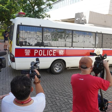 Two terrorism suspects arrive at West Kowloon Court. Photo: Winson Wong