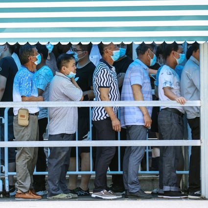 Nanjing residents queue to take coronavirus tests on Wednesday. Photo: AFP