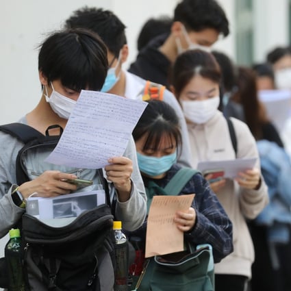 Secondary school students wait to take the Hong Kong Diploma of Secondary Education exam in Shek Kip Mei. Photo: Winson Wong