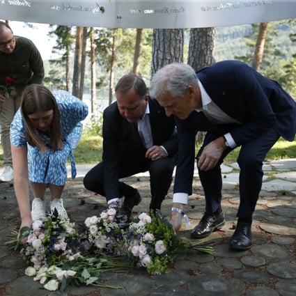 Officials including Stefan Lofven, Sweden’s prime minister, and Jonas Gahr Store, leader of the Norwegian Labour Party, lay flowers at the Utoya memorial earlier this week. Photo: NTB/DPA