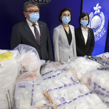 Police officials (left to right) Chan Kong-ming, Ng Wing-sze and Ip Sau-lan display a haul of drugs seized in a series of raids over the past two days. Photo: May Tse