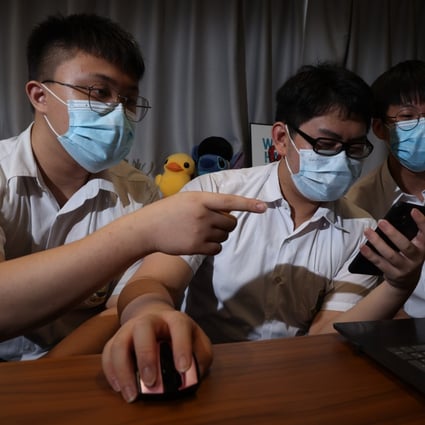 Form Five students (from left) Chris Wan, Bevis Liu Jinbang and Henry Huang talk about the risks of an unsafe internet. Photo: K. Y. Cheng