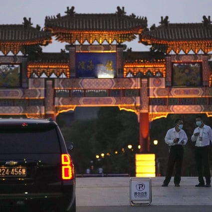 A US embassy car outside the Tianjin hotel where talks between US and Chinese officials are taking place. Photo: AP