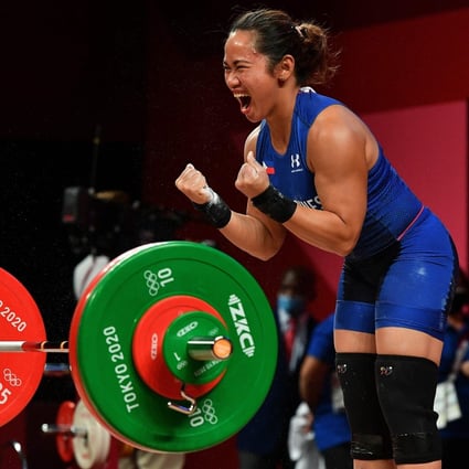 Philippines’ Hidilyn Diaz reacts while competing in the women’s 55kg weightlifting competition during the Tokyo 2020 Olympic Games at the Tokyo International Forum. Photo: AFP