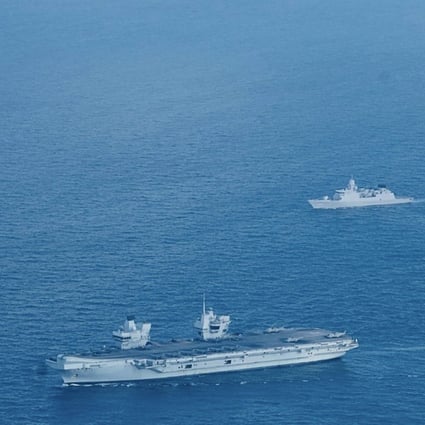 HMS Queen Elizabeth (left) and other ships in the South China Sea region on July 26. Photo: Handout