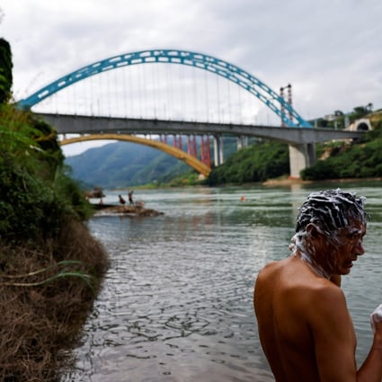 A resident of Xishuangbanna Dai autonomous prefecture, Yunnan province, bathes in the Lancang River, as the Mekong is known in China, earlier this month. Photo: Reuters