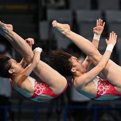 Chen Yuxi and Zhang Jiaqi of China compete during the women’s synchronised 10m platform final at Tokyo 2020 Olympics. Photo: Xinhua