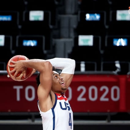 USA's Keldon Johnson goes for a dunk. Photo: AFP