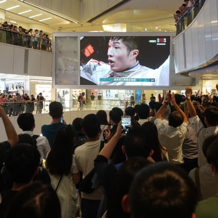 The APM mall in Kwun Tong was screening fencer Edgar Cheung’s gold medal victory on Monday. Photo: Winson Wong