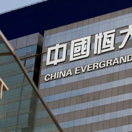 Evergrande has managed to trim its debt to about 570 billion yuan (US$87.7 billion) from a peak of 870 billion yuan in 2020. Photo: Reuters