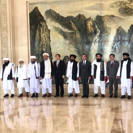 The Taliban delegation with Chinese Foreign Minister Wang Yi in Tianjin on Wednesday. Photo: Handout