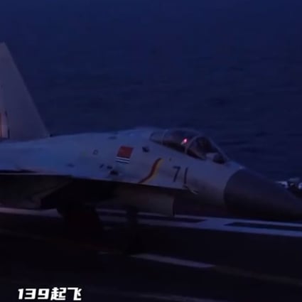 A Chinese fighter pilot prepares for a night take-off on the Liaoning aircraft carrier. Photo: Handout