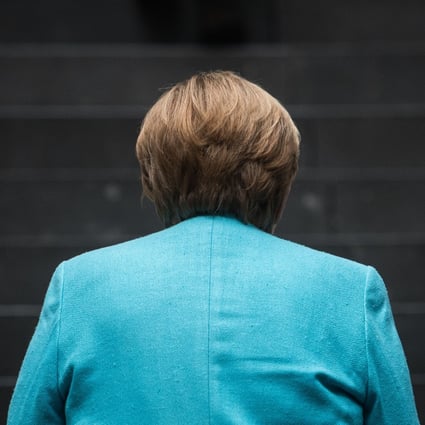 German Chancellor Angela Merkel arrives for a press conference in Berlin on July 22. She will not be seeking a fifth term in 2021. Photo: AFP