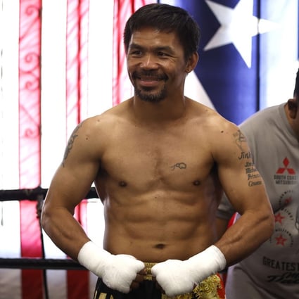 Manny Pacquiao poses for the media at Wild Card Boxing Club in Los Angeles. Photo: AFP