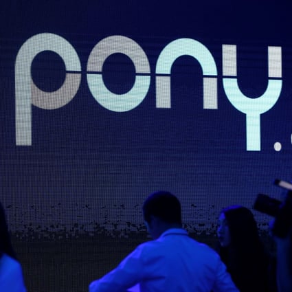 The Pony.ai logo is seen on a screen during an event in Beijing in May. Photo: Reuters