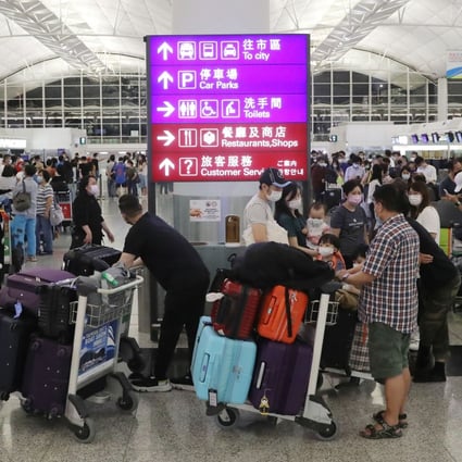 Passengers wait at check-in counters at Hong Kong International Airport. Photo: Edmond So