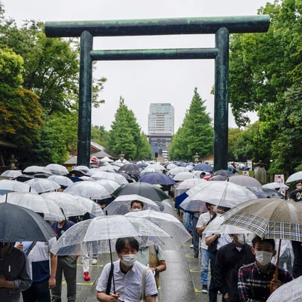 People visit Yasukuni Shrine in Tokyo to pay tribute to the country’s war dead on Sunday, the 76th anniversary of the end of World War II. Photo: EPA-EFE