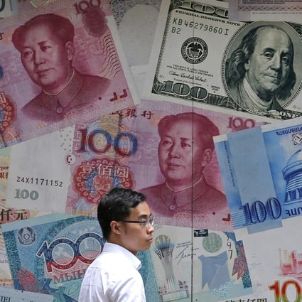 A former official under China’s State Administration of Foreign Exchange said national policymakers may want to encourage citizens to generate higher investment returns abroad. Photo: AP