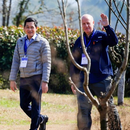 Peter Daszak and Hung Nguyen-Viet, members of the World Health Organization team tasked with investigating the origins of the new coronavirus disease, are pictured near their hotel in Wuhan, Hubei province, while on the WHO mission in China on February 6, 2021. Photo: Reuters