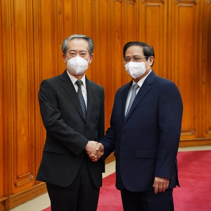 Vietnam says it will not side against China, as US’ Kamala Harris