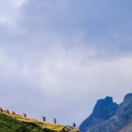 Runners on a climb during TDS at higher altitude than the main event the UTMB. Photo: Franck Oddoux / UTMB