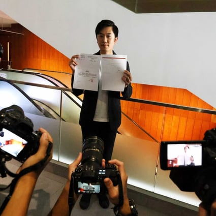 Hong Kong localist lawmaker Cheng Chung-tai meets the media after he was unseated as a Legislative Council member. Photo: Nora Tam