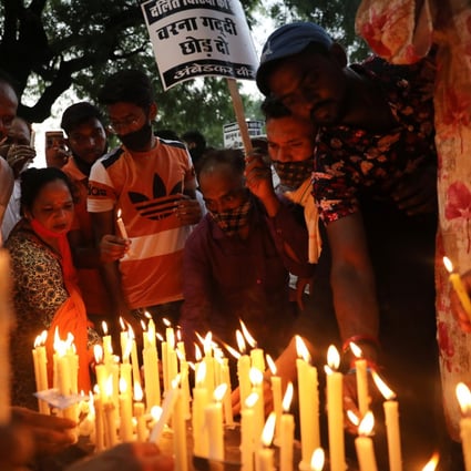 People attend a candlelight vigil following the rape and murder of a young girl in New Delhi earlier in August. Photo: Reuters