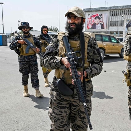 Taliban Badri special force fighters arrive at the airport in Kabul after the US pulled its final troops out of the country. Photo: AFP