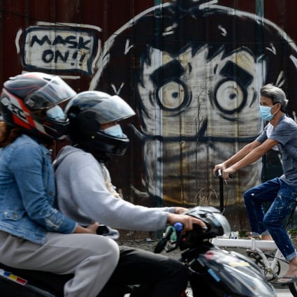 A mural reminding people to wear masks in Caloocan City, Metro Manila, Philippines. Photo: Reuters