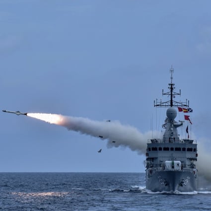 A Royal Malaysian Navy vessel fires a missile during a military exercise in the South China Sea on August 12. Malaysia is among the nations that have competing claims with China in the resource-rich waters. Photo: DPA