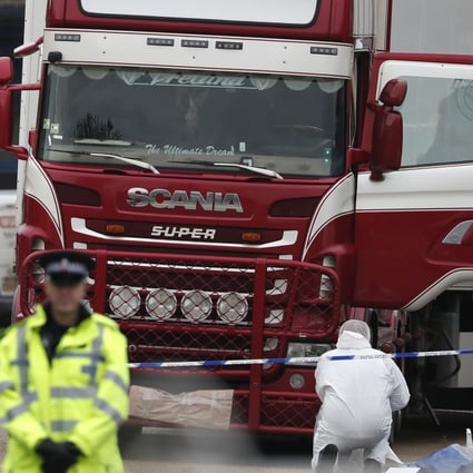 Forensics officers inspect the truck found to contain the bodies of 39 dead Vietnamese in Essex, Britain, in 2019. Photo: AP