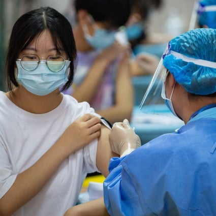 Chinese health officials late last month recommended booster shots for high-risk and vulnerable groups, but said further study was needed before extra jabs were considered for the general public. Photo: STR/AFP