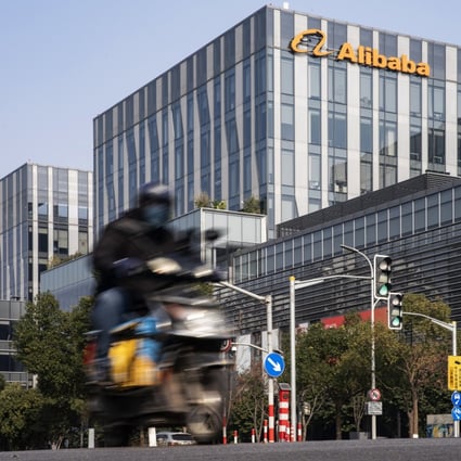 A motorist travels past an Alibaba office building in Shanghai, China, on December 24, 2020. Photo: Bloomberg