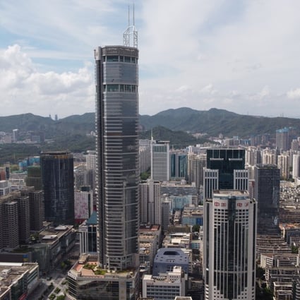 SEG Plaza standing at the Huaqiangbei area in Shenzhen on 20 May 2021. The pair of 60-metre masts blamed for causing the building’s tremors are visible on the rooftop in this photograph. Photo: Martin Chan