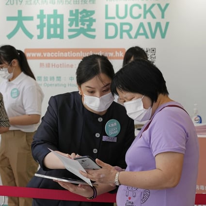 People register for a lottery in a Grand Central residential building complex in Hong Kong. Photo: AP