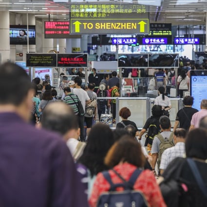 People pass through the Shenzhen Bay border checkpoint in 2018. A source has said it is unlikely that the border will be reopened before march. Photo: Dickson Lee