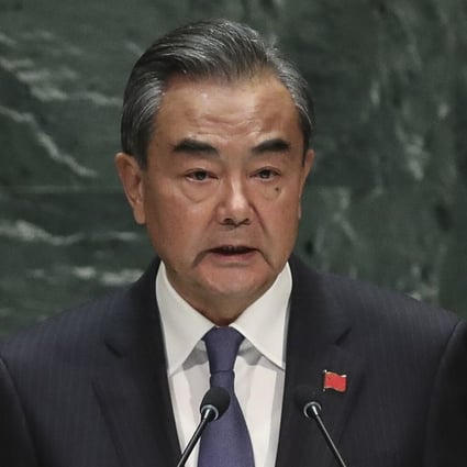 Chinese Foreign Minister Wang Yi says China will become a pillar of “an open world economy”. Photo: Getty Images/AFP
