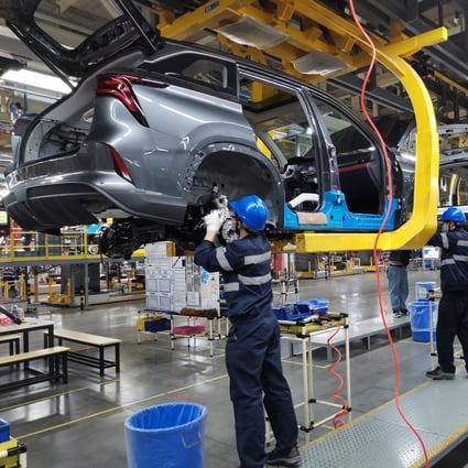 Employees work on the production line at Hefei Changan Automobile factory in Hefei in eastern Anhui province in February 2021. Photo: Xinhua
