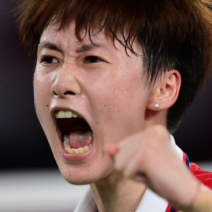 China's Chen Yufei reacts after a point won against Taiwan's Tai Tzu-ying in their women's singles badminton final match at the Tokyo 2020 Olympic Games. Photo: AFP