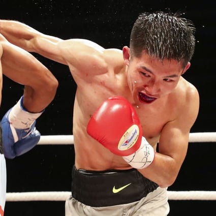 Hong Kong's Raymond Poon Kai-ching (right) fights Indonesia's Frengky Rohi in the Clash of Champions 3 at the Hong Kong Convention and Exhibition Centre in Wan Chai in 2017. Photo: SCMP / Edward Wong