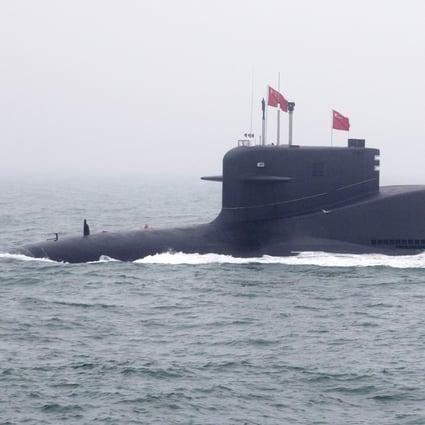 Japan claims to be monitoring a Chinese submarine along the edge of its territorial waters. Pictured is a type 094 Jin-class nuclear submarine Long March 15 of the Chinese People’s Liberation Army, taking part in an parade near Qingdao, in eastern China’s Shandong province in 2019. Photo: AFP