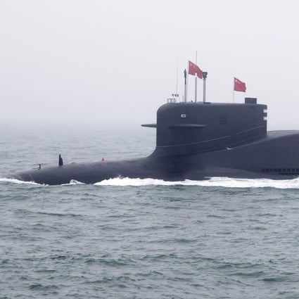 Japan claims to be monitoring a Chinese submarine along the edge of its territorial waters. Pictured is a type 094 Jin-class nuclear submarine Long March 15 of the Chinese People’s Liberation Army, taking part in an parade near Qingdao, in eastern China’s Shandong province in 2019. Photo: AFP